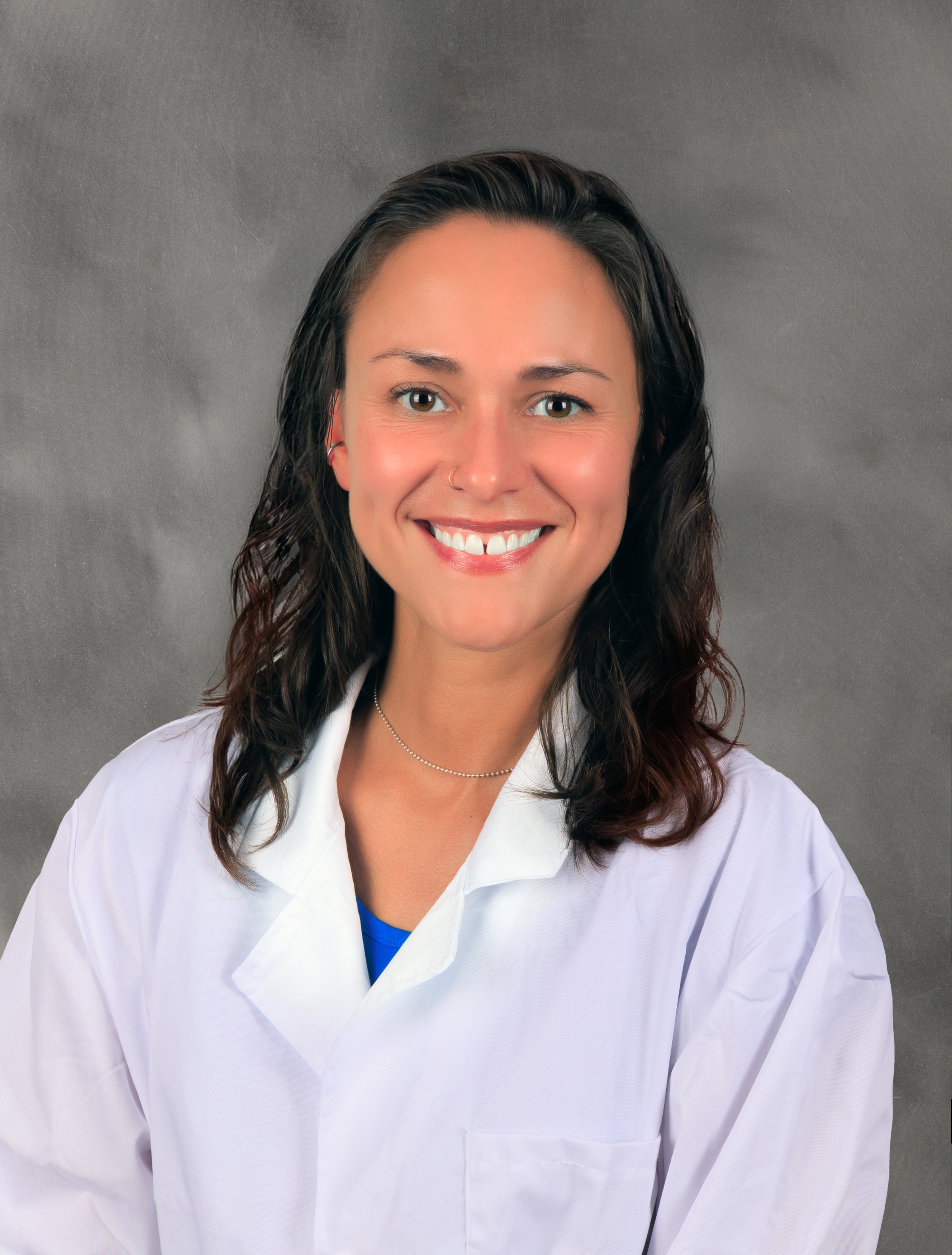 female physician in white lab coat